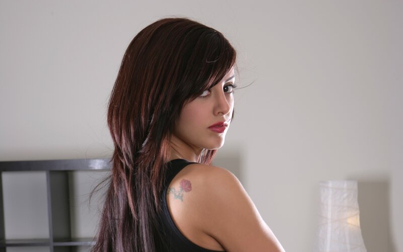 woman with rose tattoo