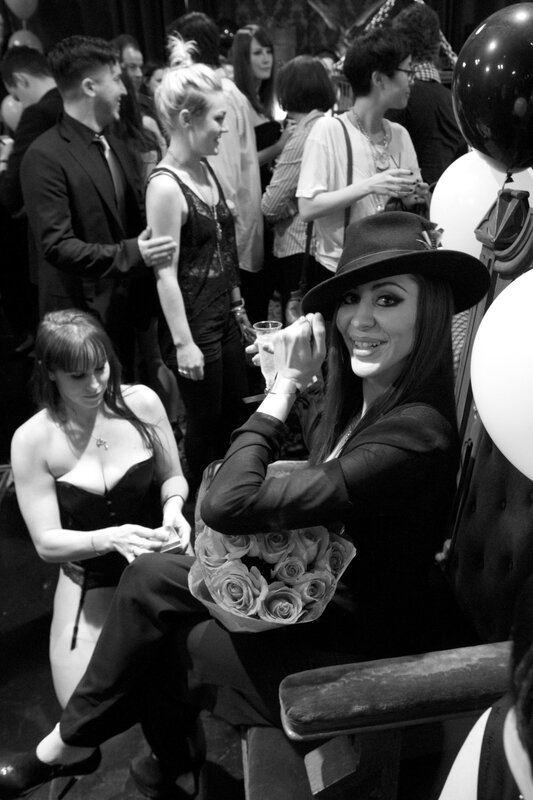 Woman with roses at party