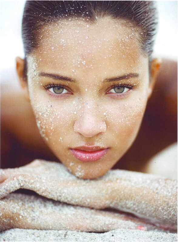 woman with sand on face
