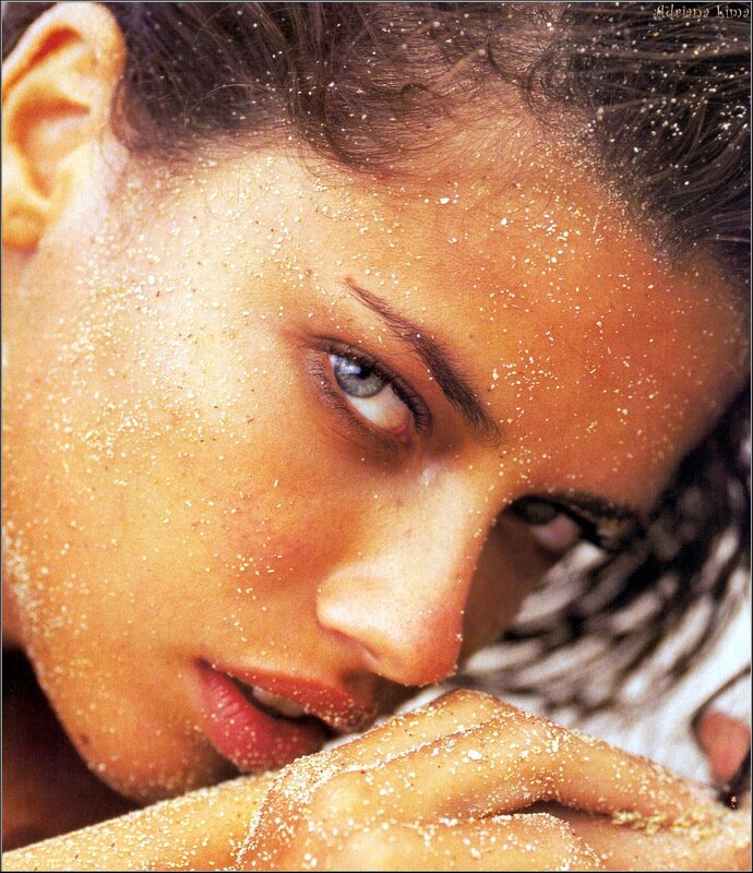 woman with sand on her face