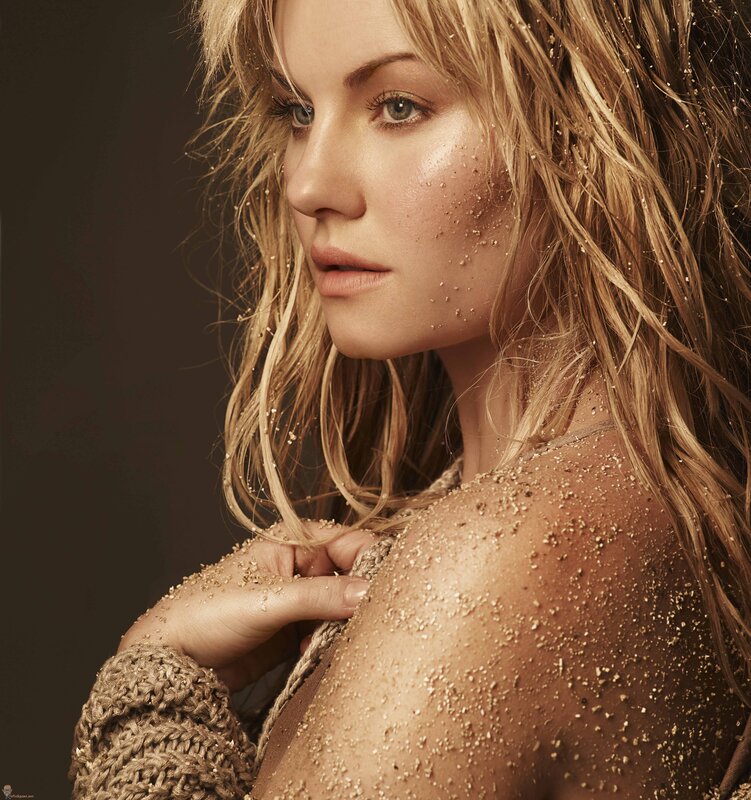 woman with sand on skin