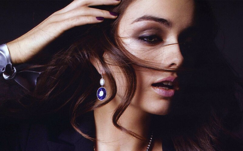 woman with sapphire earrings