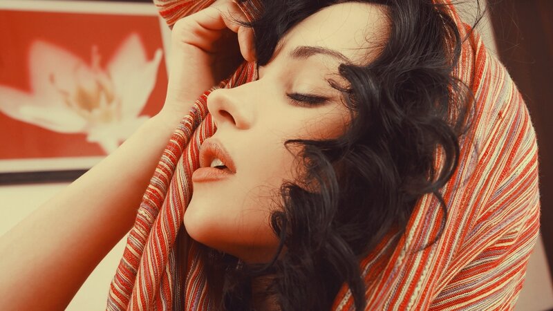 woman with scarf and closed eyes