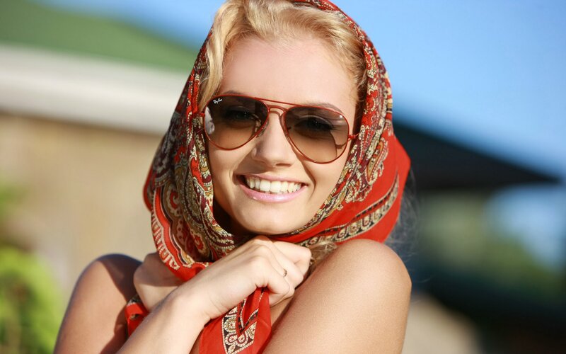 woman with scarf and sunglasses
