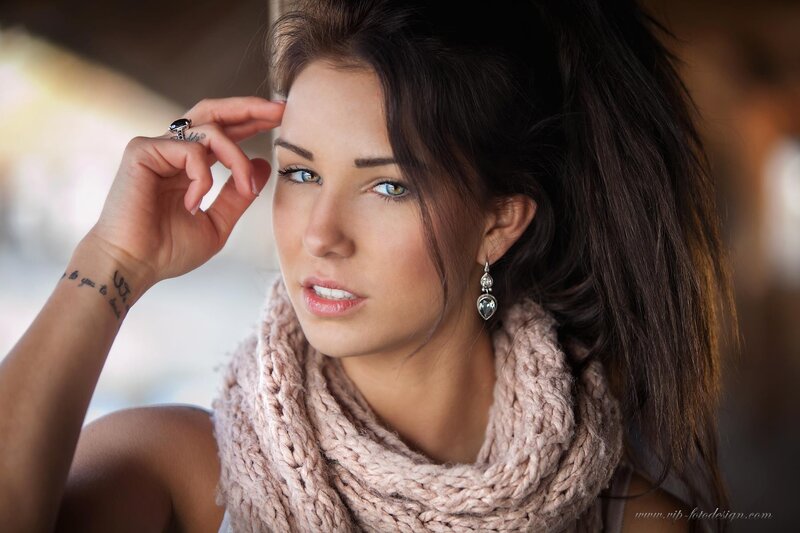 woman with scarf and tattoo