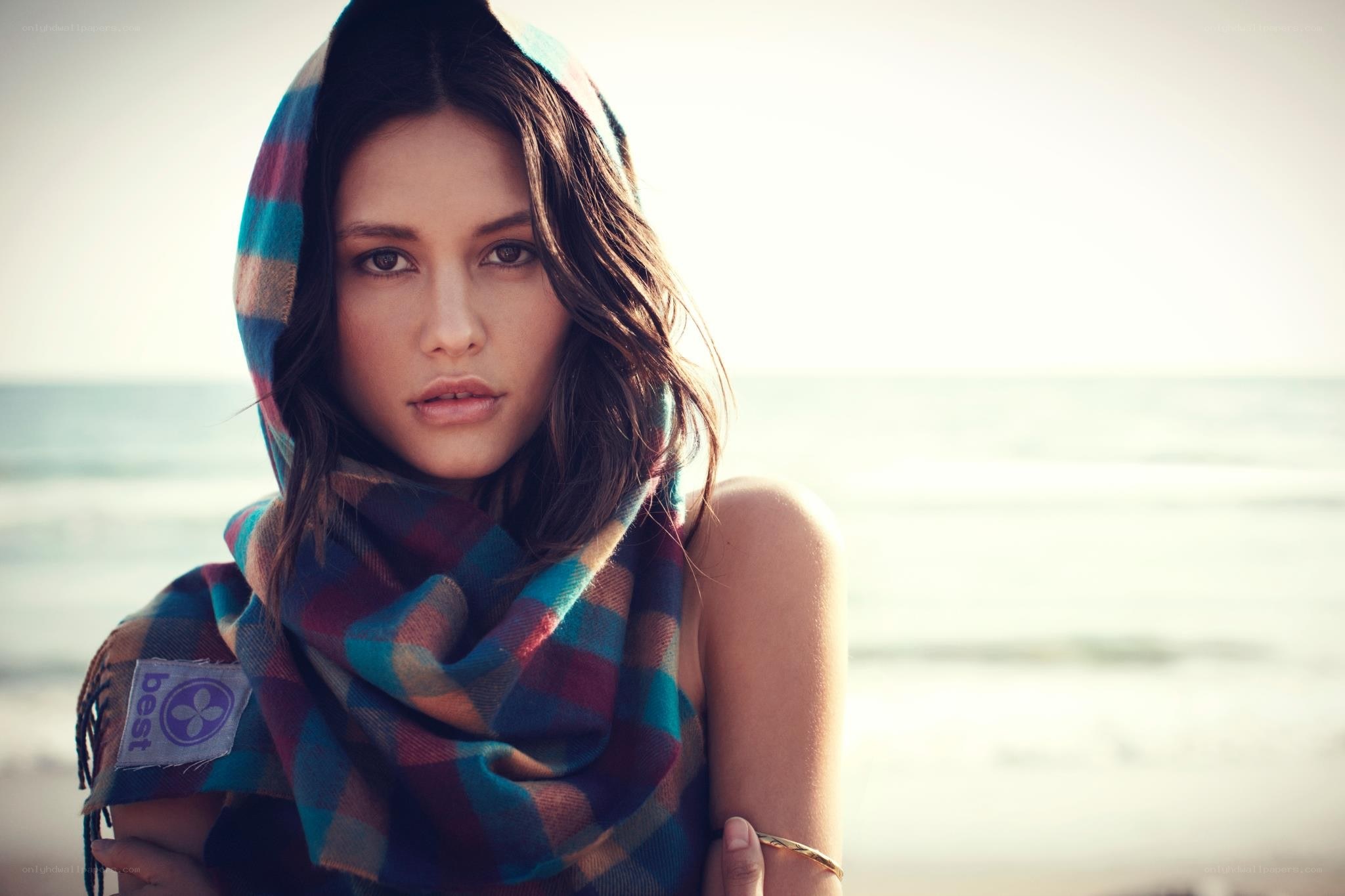 woman with scarf at beach