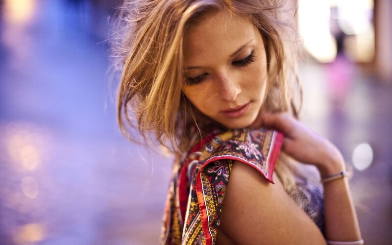 woman with scarf in city