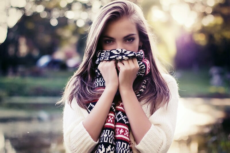 woman with scarf in park