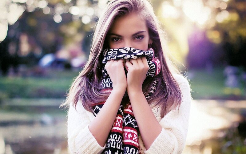 woman with scarf in park
