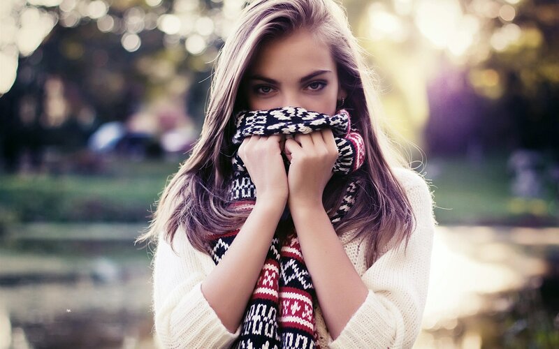 woman with scarf in park