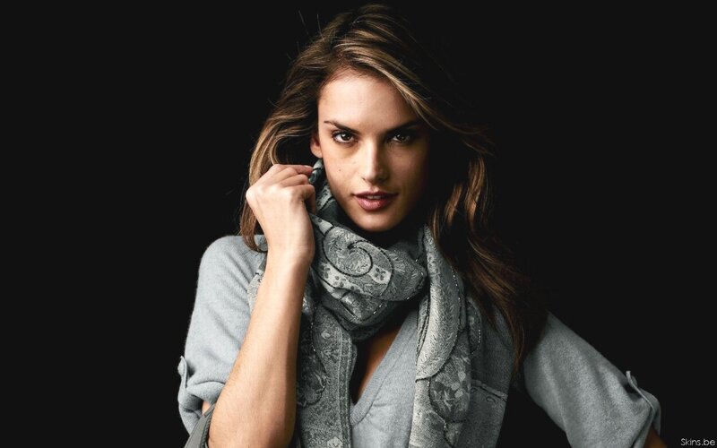 woman with scarf looking at camera