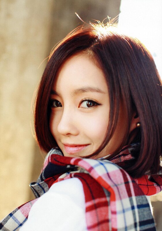 woman with scarf smiling