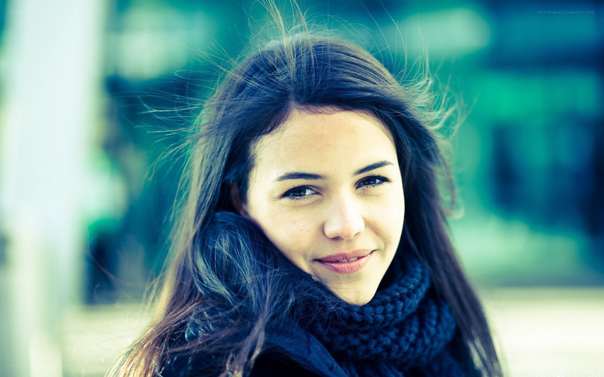 woman with scarf smiling