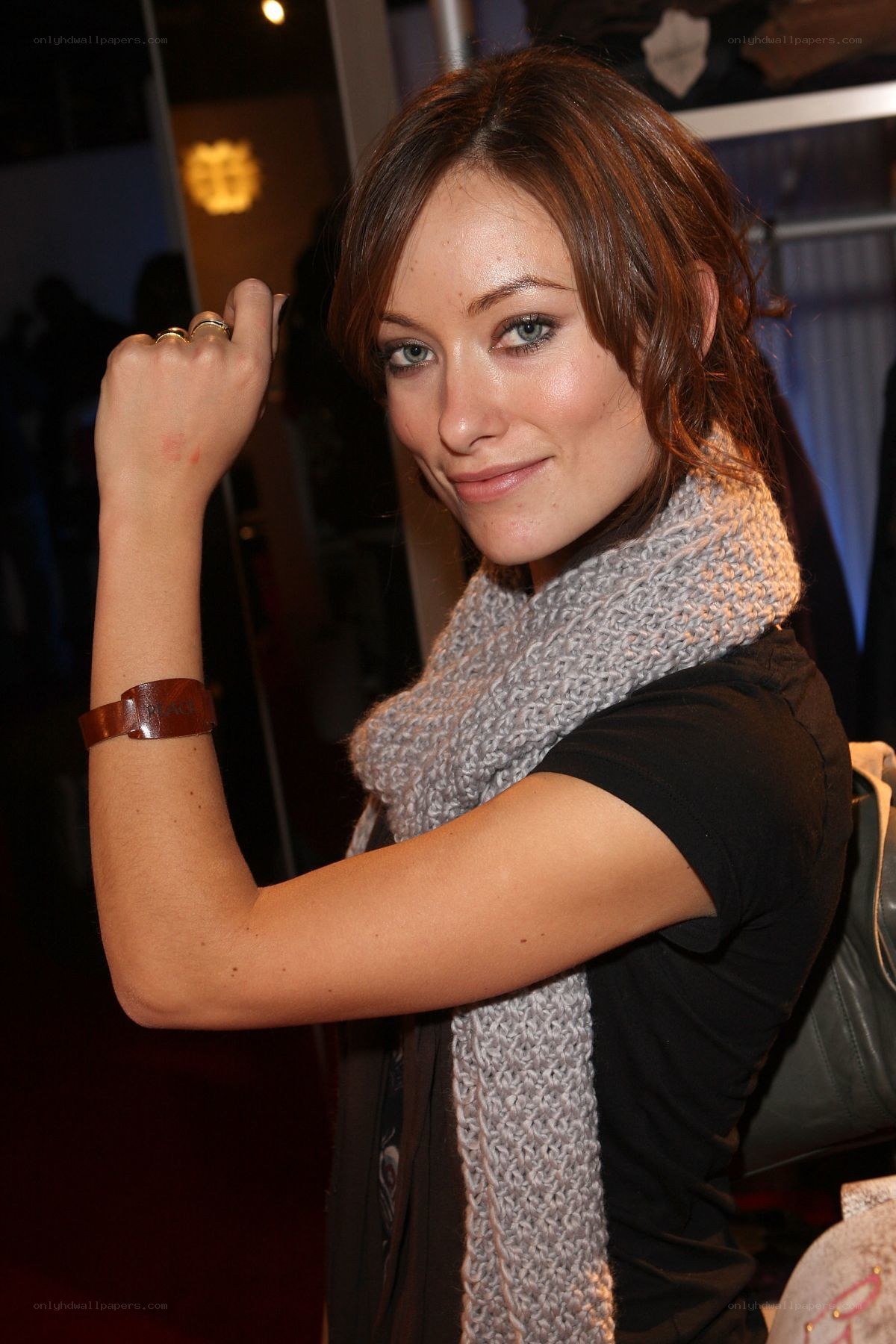 woman with scarf smiling