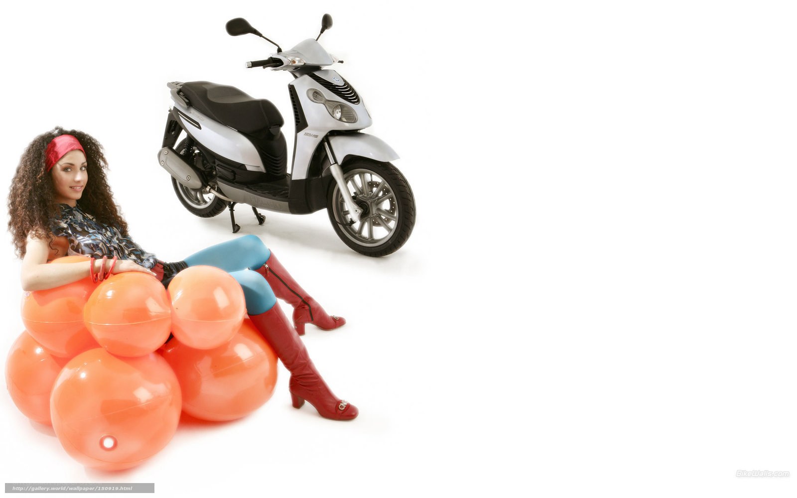 woman with scooter and balloons