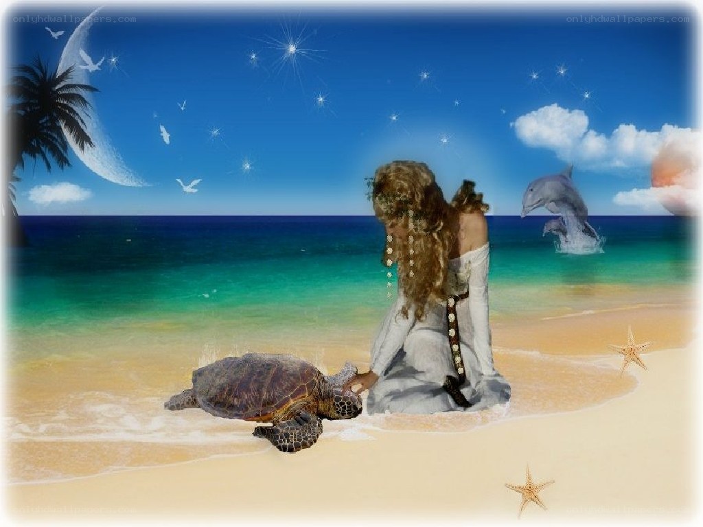 woman with sea turtle on beach