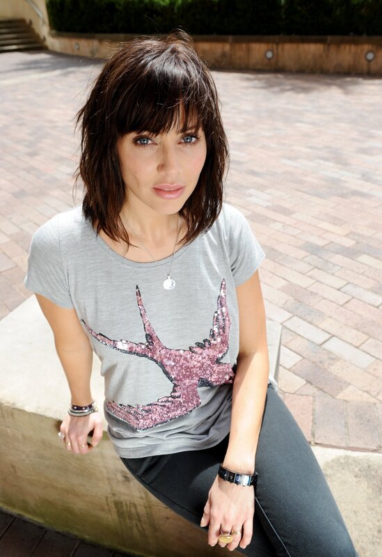 woman with sequin bird t-shirt