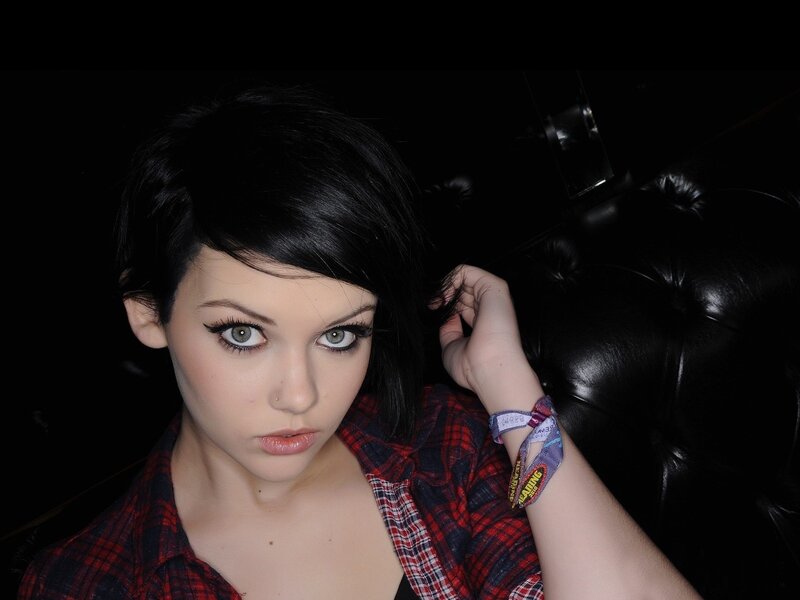 Woman with Short Black Hair — Dramatic, Night, Photograph, Plaid Shirt, Wristbands