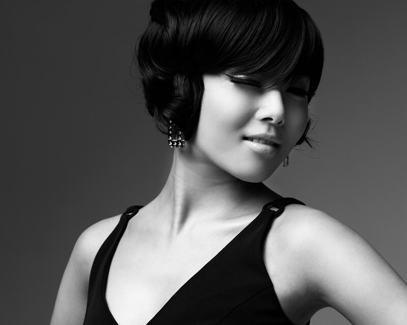Woman with Short Black Hair — Dramatic, Photograph, Earrings
