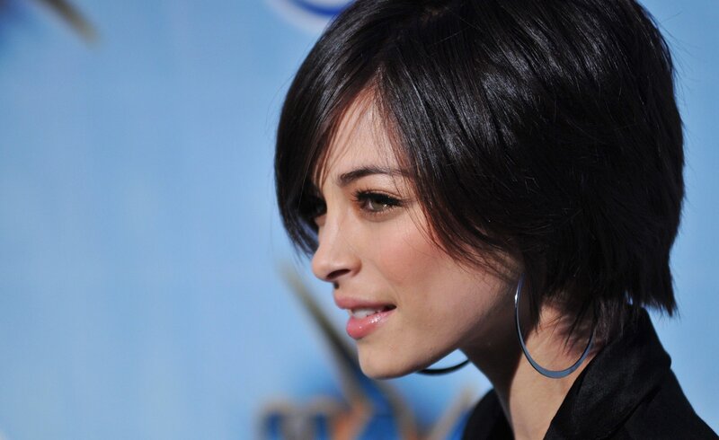 Woman with Short Black Hair — Neutral, Photograph, Earring