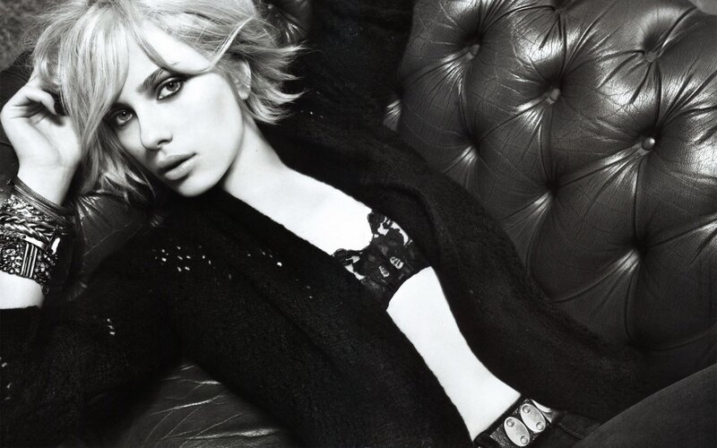 Woman with Short Blonde Hair — Black, Dramatic, Photograph, Black Leather Couch