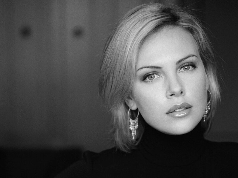 Woman with Short Blonde Hair — Black, Serious, Photograph, Earrings