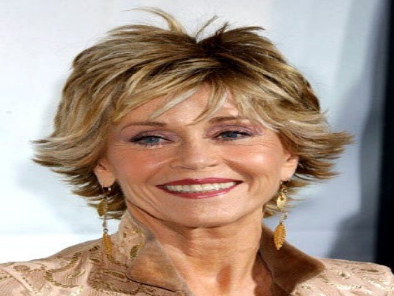 Woman with Short Blonde Hair — Brown, Smiling