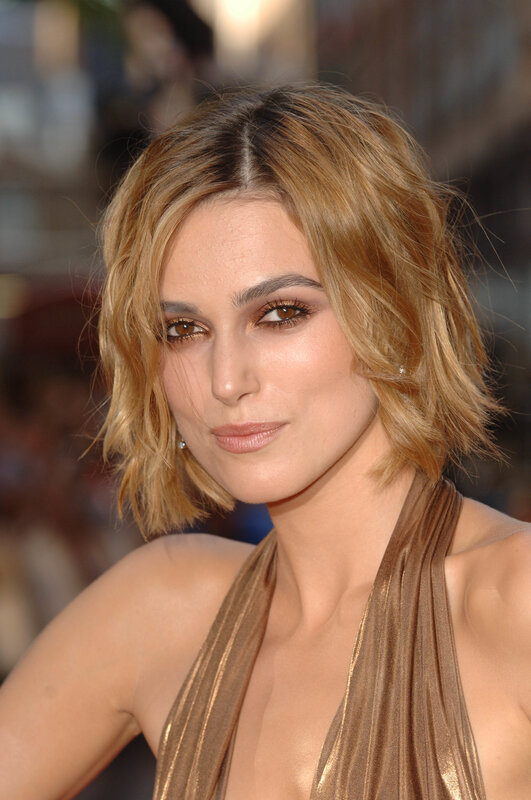 Woman with Short Blonde Hair — Gold, Formal