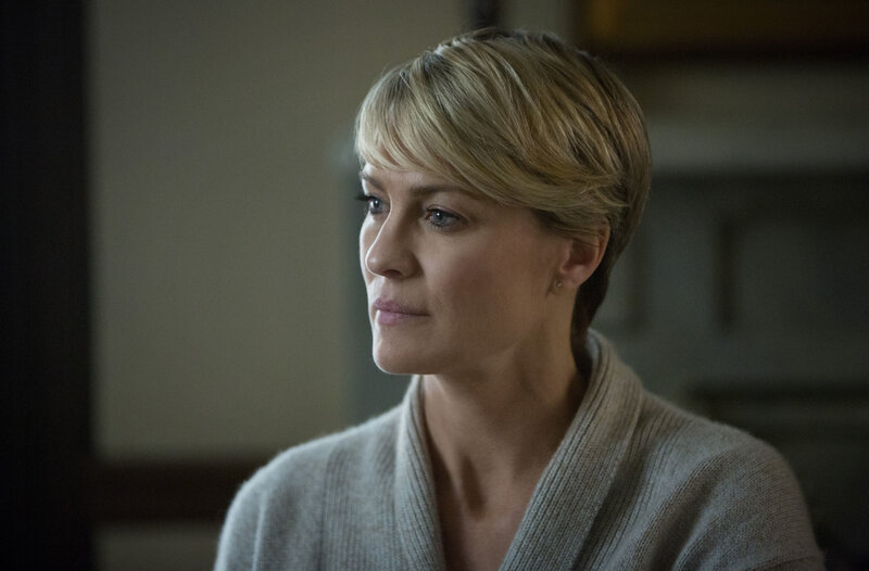 Woman with Short Blonde Hair — Gray, Serious