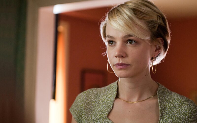Woman with Short Blonde Hair — Green, Serious
