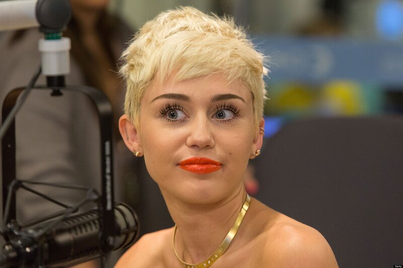 Woman with Short Blonde Hair — Neutral, Photograph, Microphone