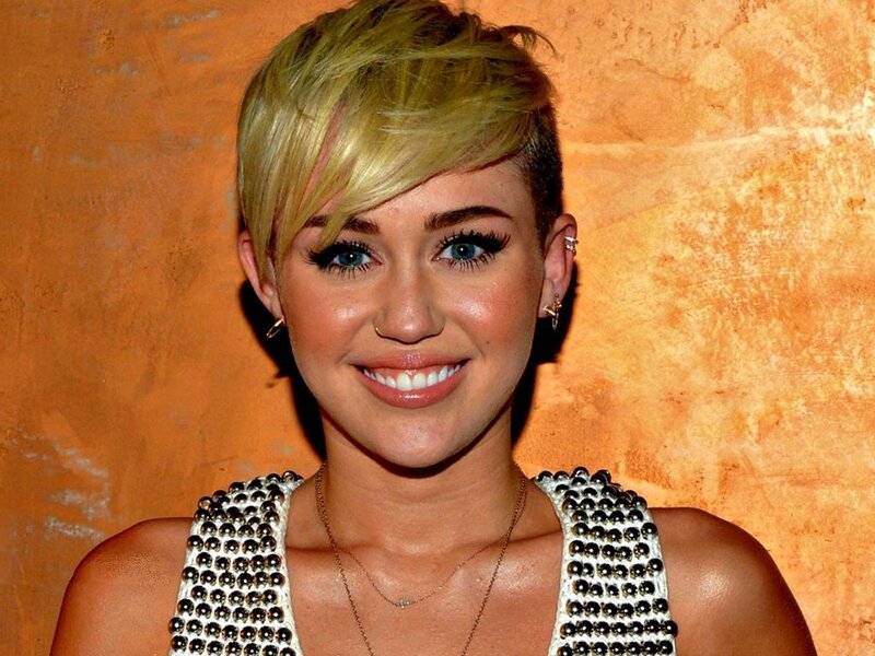 Woman with Short Blonde Hair — Orange