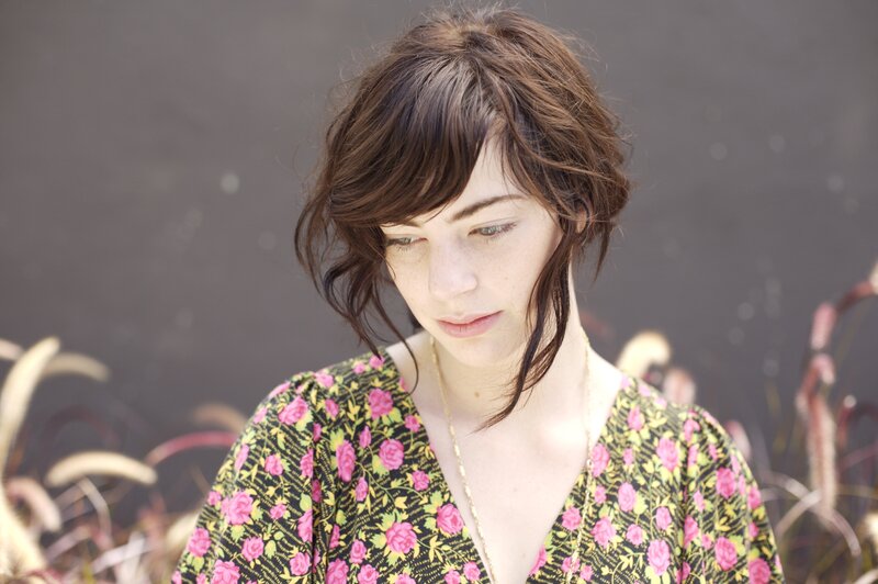 Woman with Short Brown Hair — Black, Contemplative