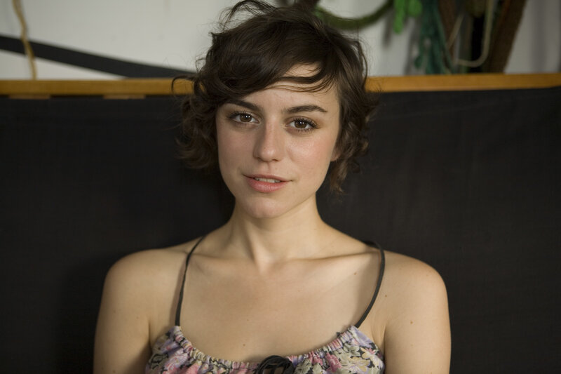 Woman with Short Brown Hair — Neutral, Photograph, Black Backdrop