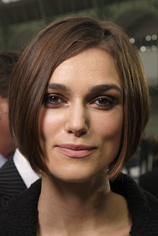 Woman with Short Brown Hair — Neutral, Photograph, Black Coat