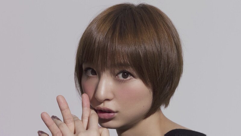 Woman with Short Brown Hair — Neutral, Photograph, Hand