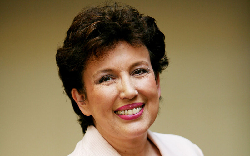 Woman with Short Dark Hair — Beige, Friendly