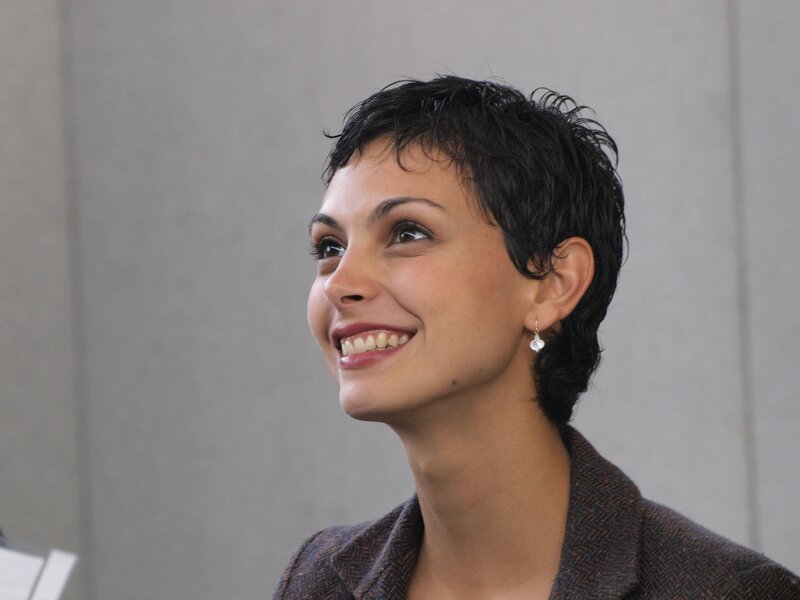 Woman with Short Dark Hair — Gray, Smiling