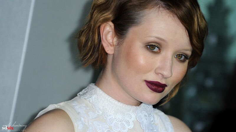 woman with short hair and dark lipstick