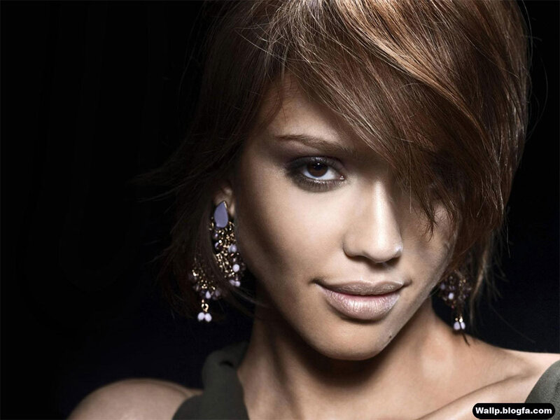 woman with short hair and earrings