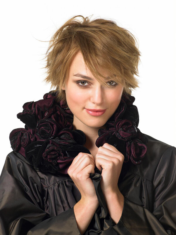 woman with short hair and floral scarf