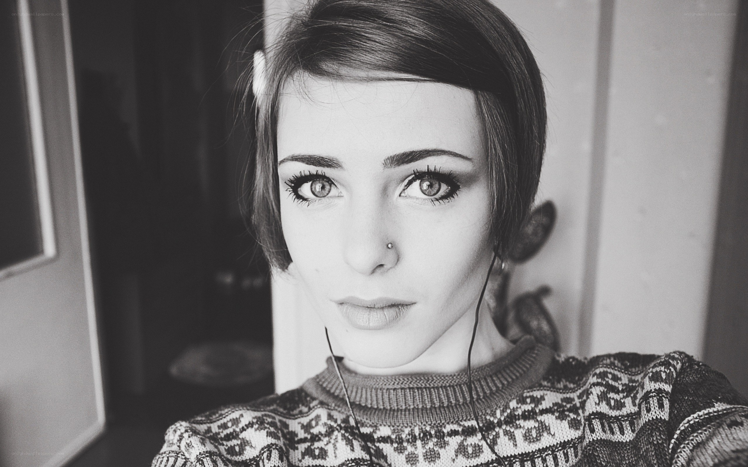 woman with short hair and nose piercing