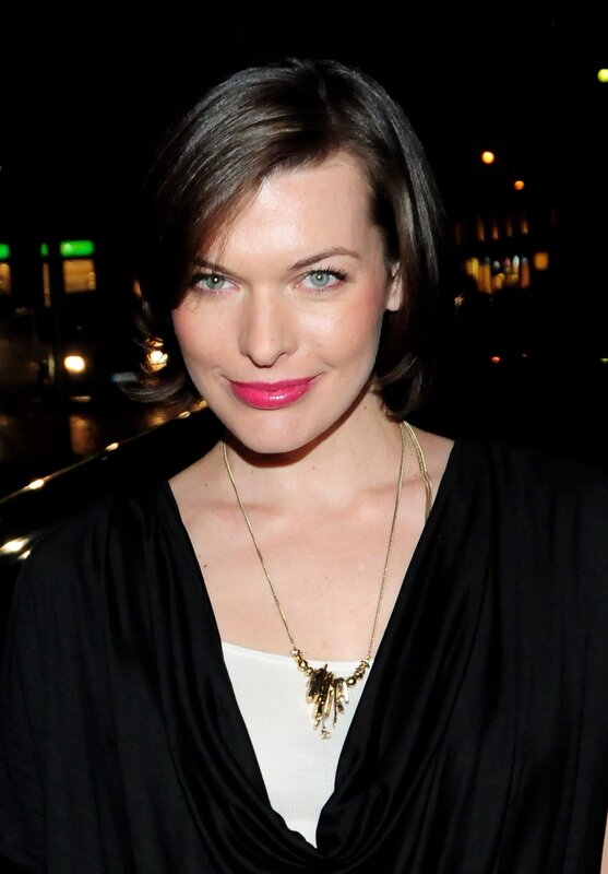 woman with short hair and pink lipstick