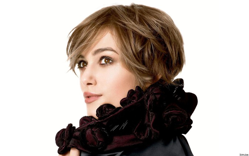 woman with short hair and scarf