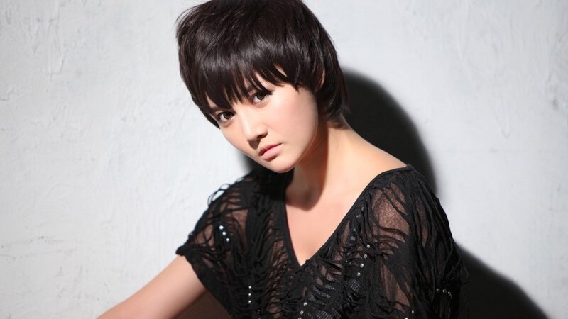 Woman with Short Hair — Black, Dramatic, Photograph, Black Top, Wall