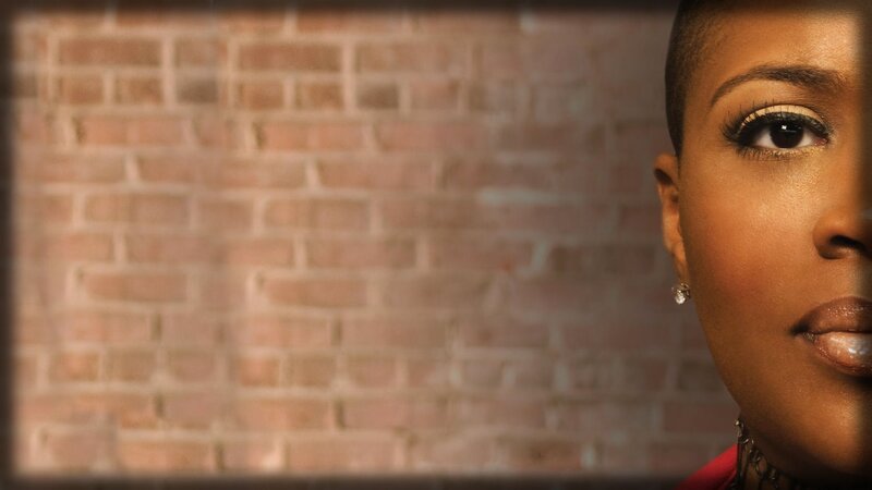 Woman with Short Hair — Brown, Dramatic, Photograph, Brick Wall, Earring