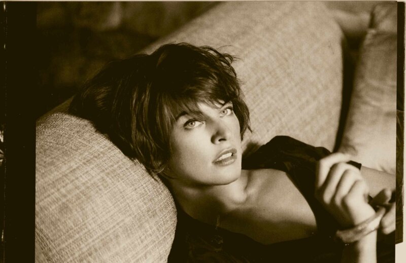 Woman with Short Hair — Brown, Dramatic, Photograph, Couch, Pillow