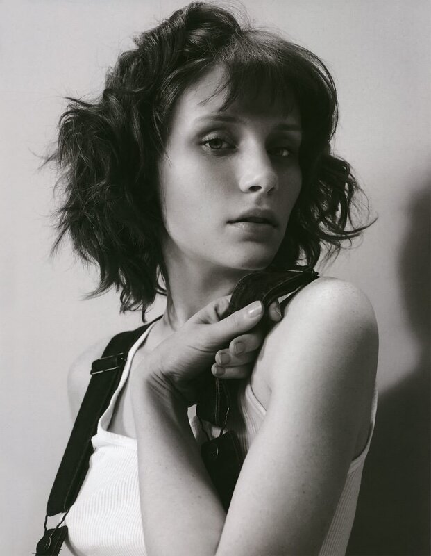 woman with short hair in black and white