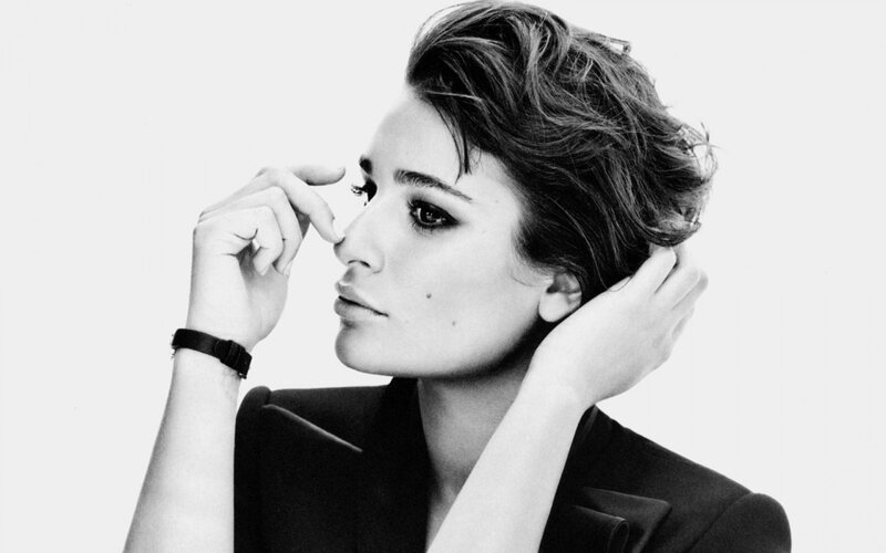 woman with short hair in black and white