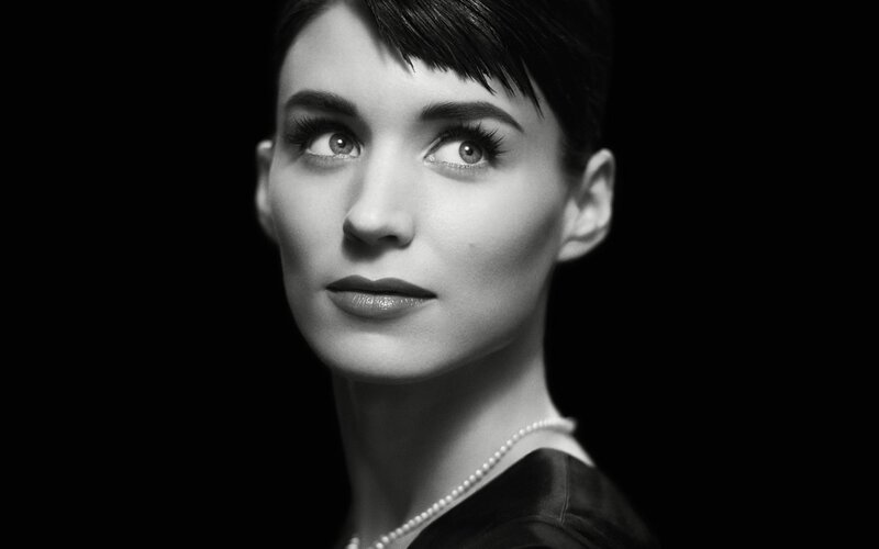 woman with short hair in black and white